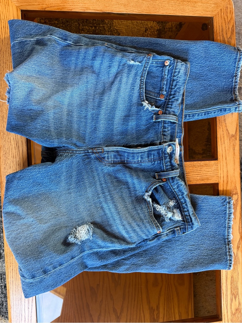 Levi’s wedgie distressed jeans